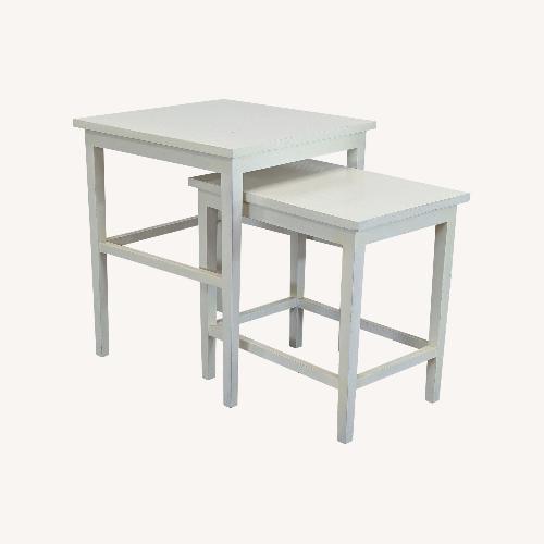 Used Set of Two Wood Nesting Tables for sale on AptDeco