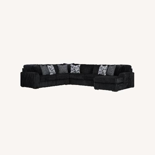 Used Midnight-Madness 4-Piece Sectional with Chaise for sale on AptDeco