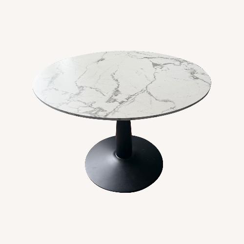 Used White Wood Dining Table with Marble Finish  for sale on AptDeco