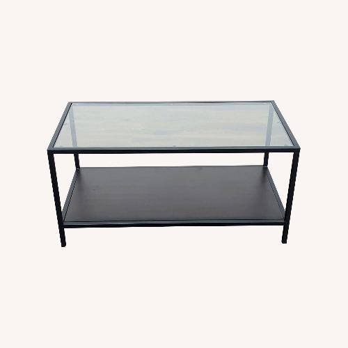 Used Glass Top Metal Coffee Table with Shelf	 for sale on AptDeco