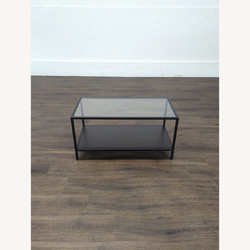 Used Glass Top Metal Coffee Table with Shelf	 for sale on AptDeco