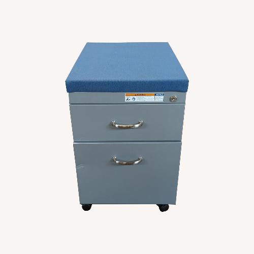 Used 2-Drawer Mobile File Cabinet with Blue Cushion Top for sale on AptDeco