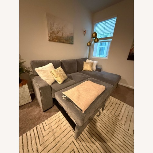 Used Modern 2-Piece Sectional with Pull-out Bed  for sale on AptDeco