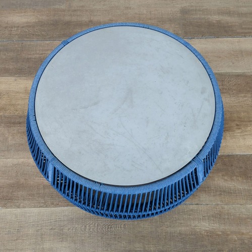 Used Stone Top Outdoor Cocktail Table	 for sale on AptDeco