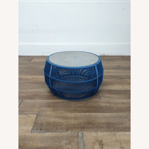 Used Stone Top Outdoor Cocktail Table	 for sale on AptDeco