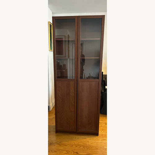 Used IKEA Billy Oxberg Dark Brown Wood Bookcase for sale on AptDeco