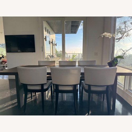 Used Dark Brown Wood Dining Table for sale on AptDeco