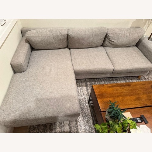 Used Modern Light Gray Sectional Sofa with Chaise	 for sale on AptDeco