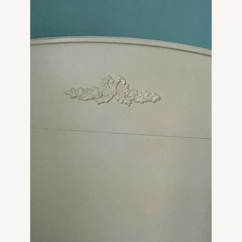 Used  White Wood Twin Bed With Decorative Rose Carving for sale on AptDeco