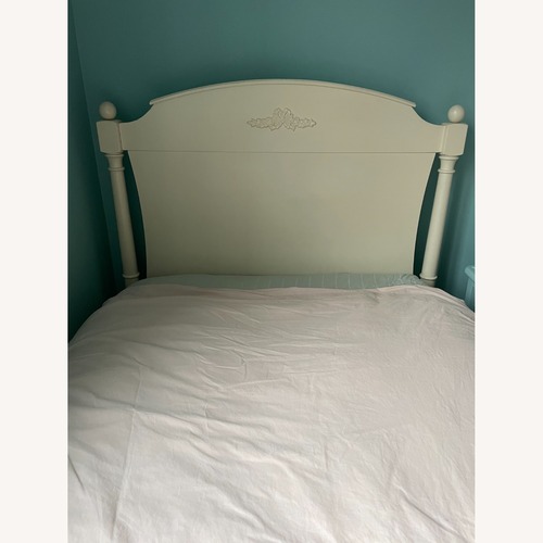 Used  White Wood Twin Bed With Decorative Rose Carving for sale on AptDeco