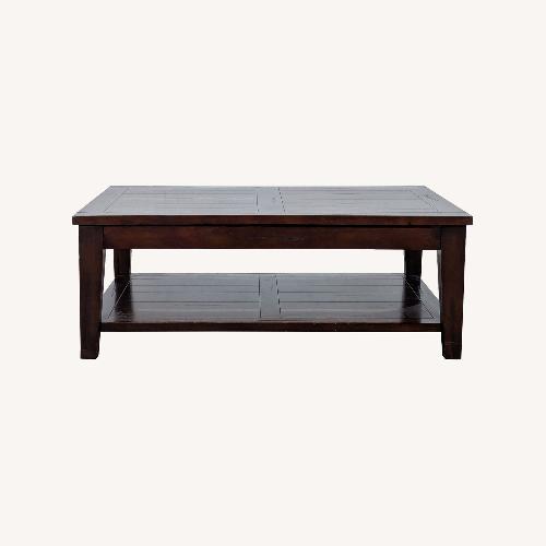 Used World Market Wood Coffee Table with Shelf for sale on AptDeco