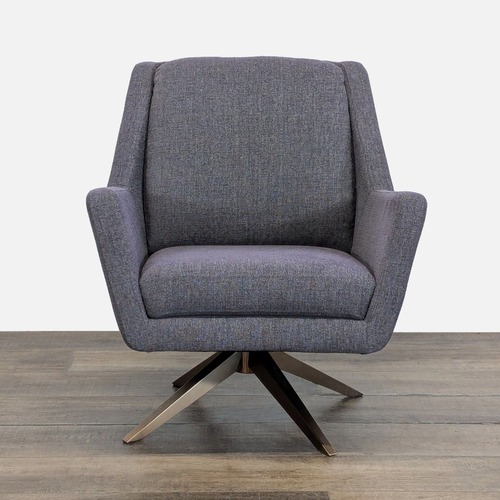 Used Greta Swivel Modern Armchair with Pyramidal Base	 for sale on AptDeco