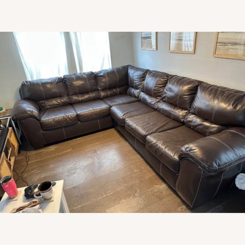 Used Vintage/Antique Dark Brown 2 Piece Sectional for sale on AptDeco