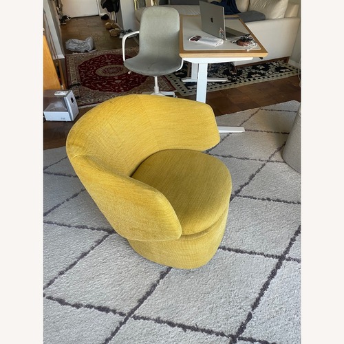 Used West Elm Crescent Swivel Chair for sale on AptDeco