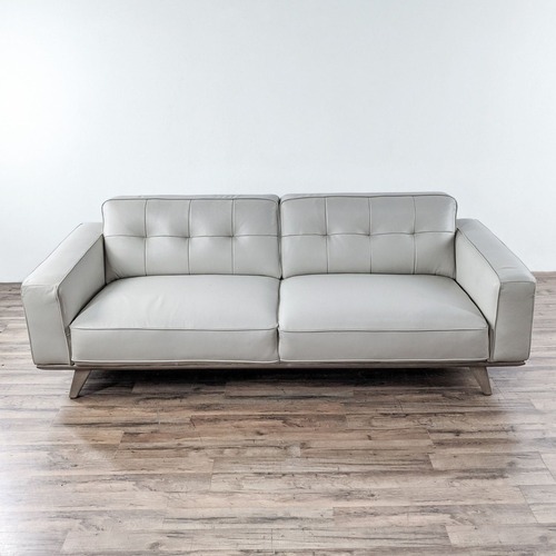 Used Living Spaces Caressa Leather Dove Grey Sofa for sale on AptDeco