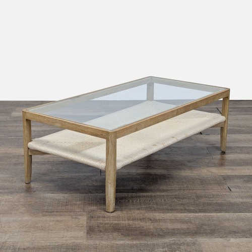 Used Glass Top Wood Coffee Table with Woven Shelf	 for sale on AptDeco
