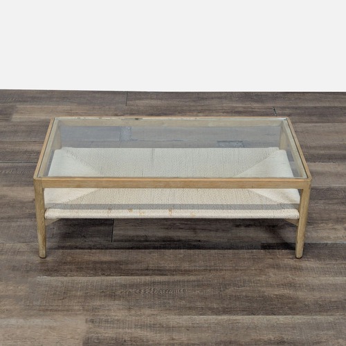 Used Glass Top Wood Coffee Table with Woven Shelf	 for sale on AptDeco