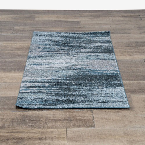 Used Dalyn MG5993 Area Rug in Teal for sale on AptDeco
