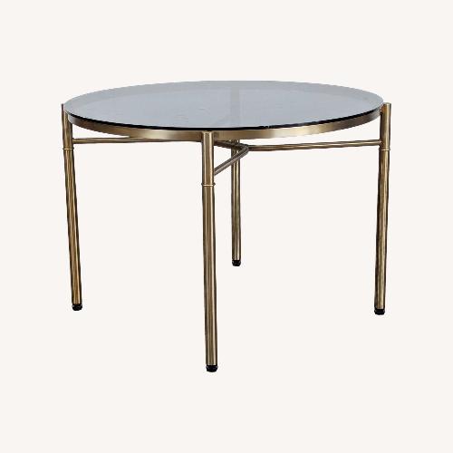 Used Smoked Glass Top Dining Table for sale on AptDeco