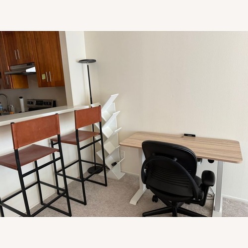 Used Leather Counter Stool on Metal Frame	 for sale on AptDeco