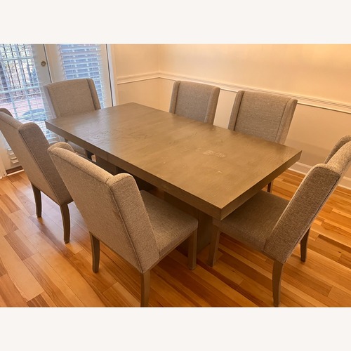 Used Fawnburg Dining Table with Extension + 6 Chairs for sale on AptDeco