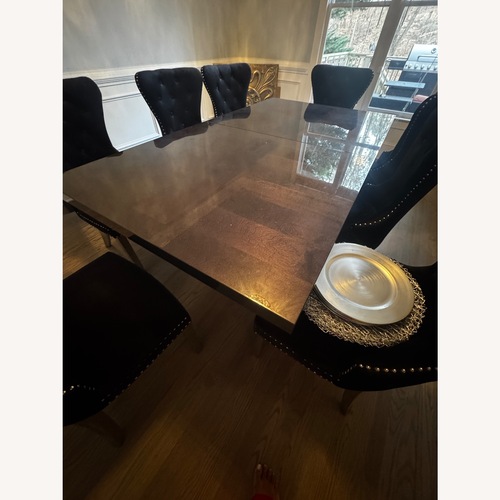 Used  Black Wood Dining Table for sale on AptDeco