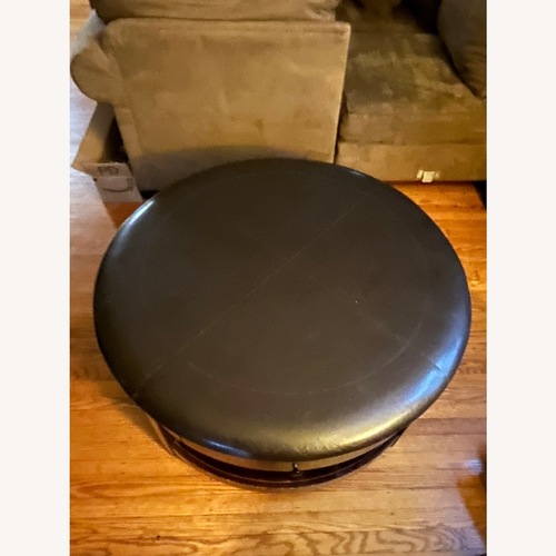 Used Raymour & Flanigan Leather Coffee Table/Ottoman for sale on AptDeco