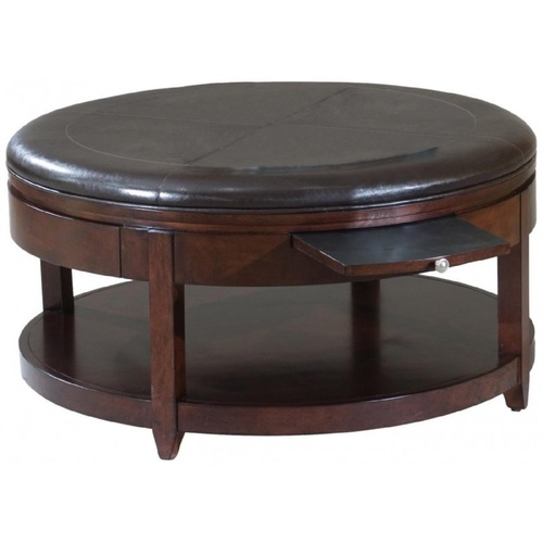 Used Raymour & Flanigan Leather Coffee Table/Ottoman for sale on AptDeco