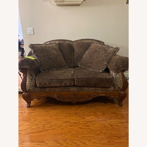 Used Vintage/Antique 700 Dark Brown Loveseat for sale on AptDeco
