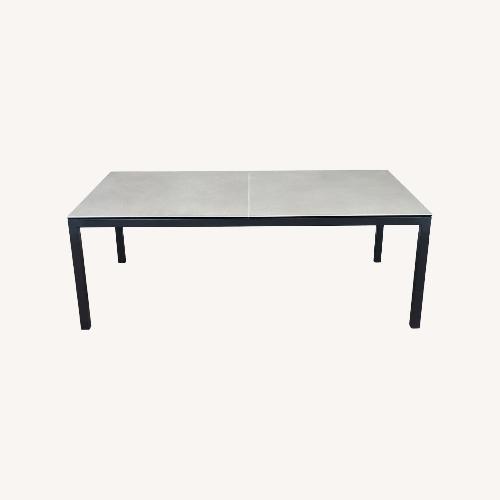 Used Room & Board Parsons Dining Table with Ceramic Top for sale on AptDeco