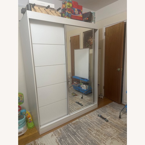 Used White Armoire with a Mirror for sale on AptDeco