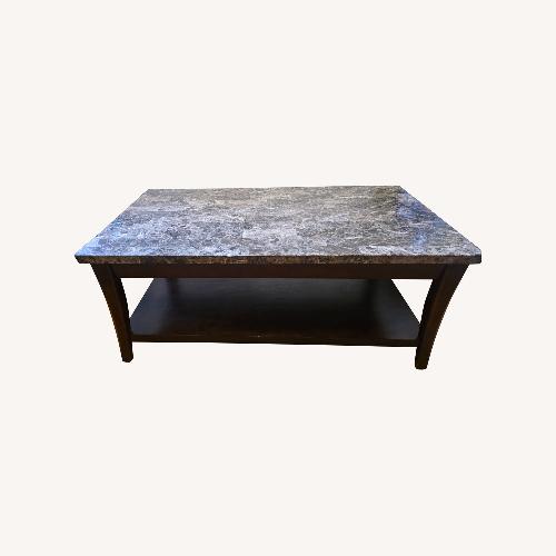 Used Raymour & Flanigan Dark Brown Gen Marble Coffee Table for sale on AptDeco