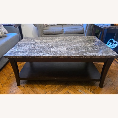 Used Raymour & Flanigan Dark Brown Gen Marble Coffee Table for sale on AptDeco