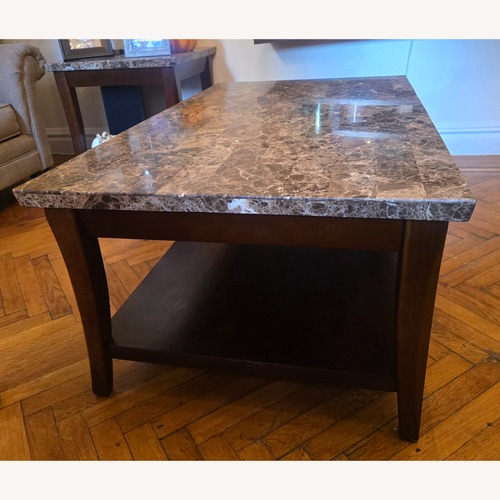 Used Raymour & Flanigan Dark Brown Gen Marble Coffee Table for sale on AptDeco