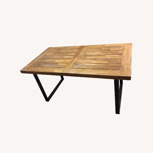 Used Dark Brown Wood Dining Table for sale on AptDeco