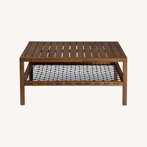 Used Article Callais 35.5" Outdoor Coffee Table - Latte Brown for sale on AptDeco