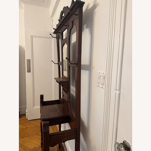 Used Vintage/Antique Dark Brown Wood Coat Rack for sale on AptDeco