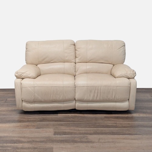 Used Traditional Cream Leather Reclining Loveseat	 for sale on AptDeco