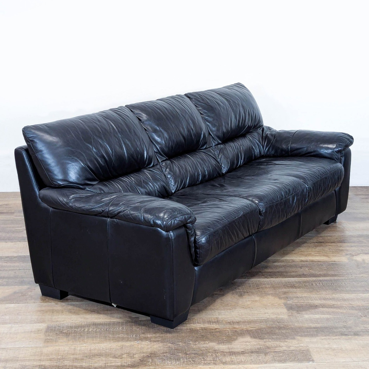 Ashley Furniture 3-Seat Black Leather Sofa - image-2
