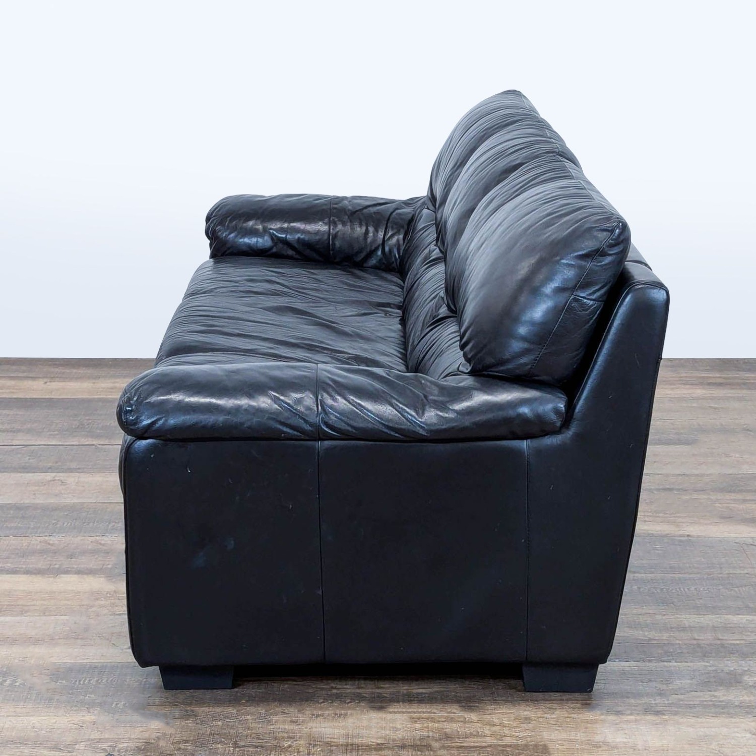 Ashley Furniture 3-Seat Black Leather Sofa - image-4