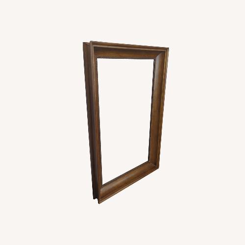 Used Beveled Glass Wall Mirror with Beaded Trim Wood for sale on AptDeco