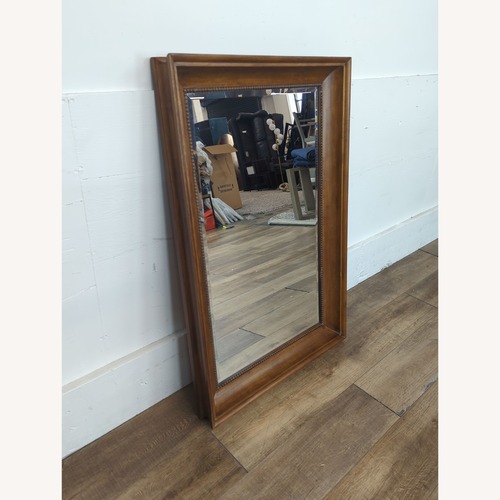 Used Beveled Glass Wall Mirror with Beaded Trim Wood for sale on AptDeco