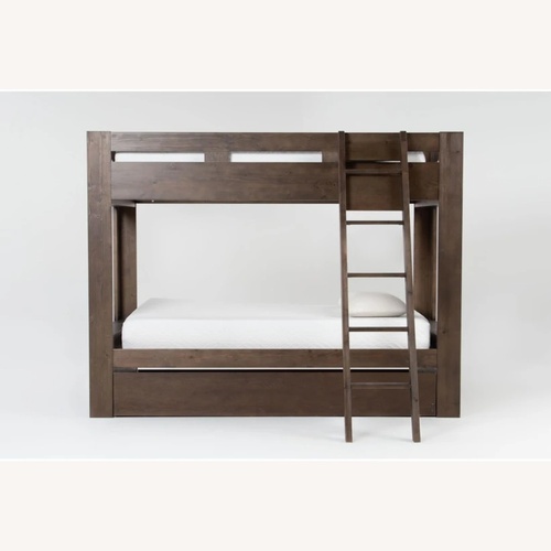 Used Living Spaces Natural Wood Bunk Bed for sale on AptDeco