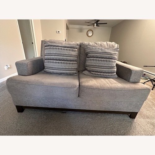 Used Ashley Furniture Light Gray Loveseat for sale on AptDeco