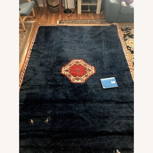 Used Blue Wool Area Rug 7' x 9.5' for sale on AptDeco