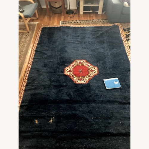 Used Blue Wool Area Rug 7' x 9.5' for sale on AptDeco