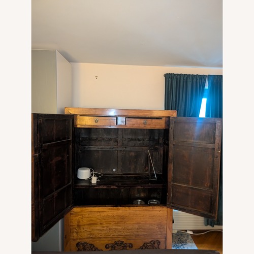 Used Light Brown Armoire for sale on AptDeco