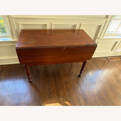 Used Side Table With Leaves for sale on AptDeco