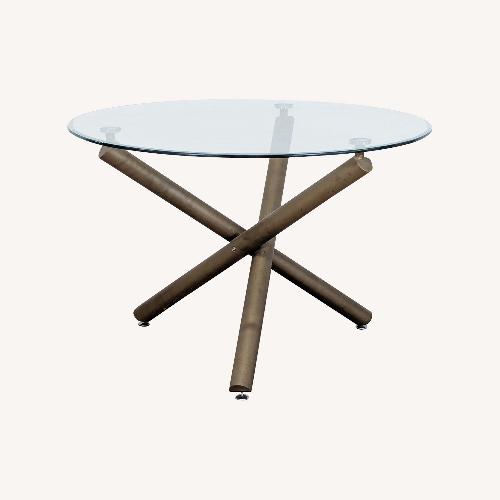 Used Glass Top Dining Table on Metal Base for sale on AptDeco