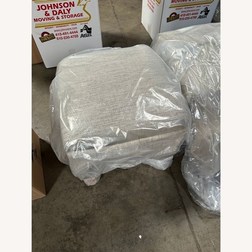 Used Skirt Covered Ottoman for sale on AptDeco